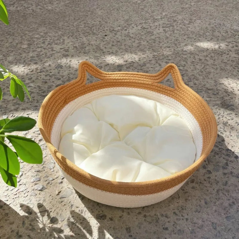 A woven cat bed featuring a removable and washable rattan design Brownstick