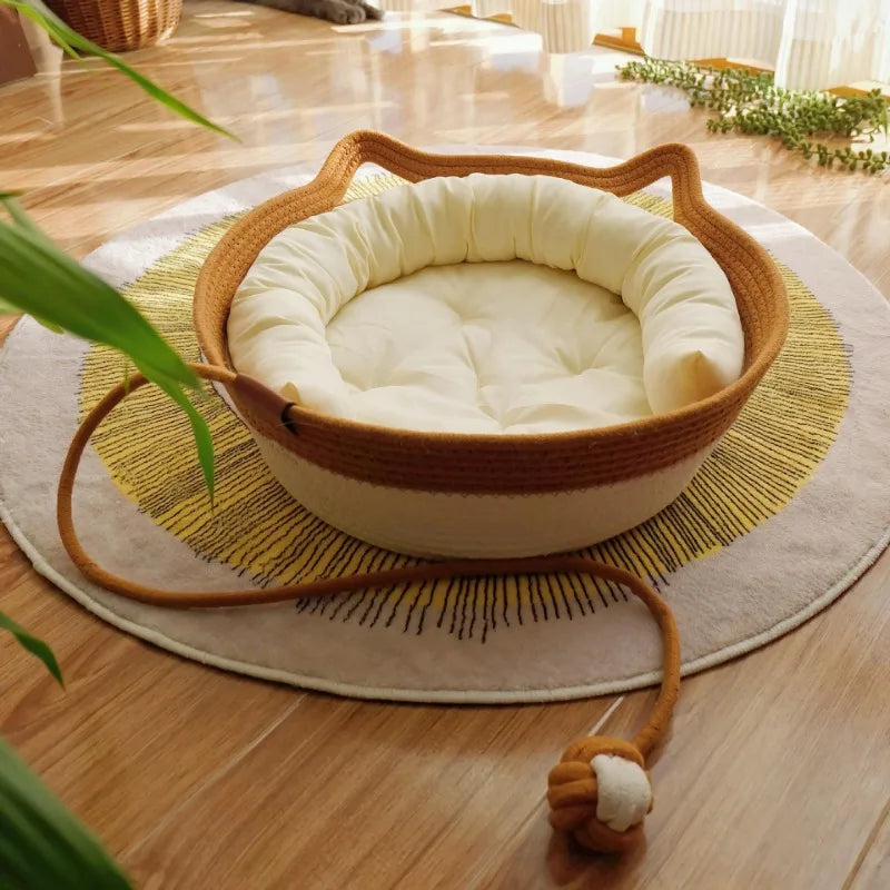 A woven cat bed featuring a removable and washable rattan design Brownstick